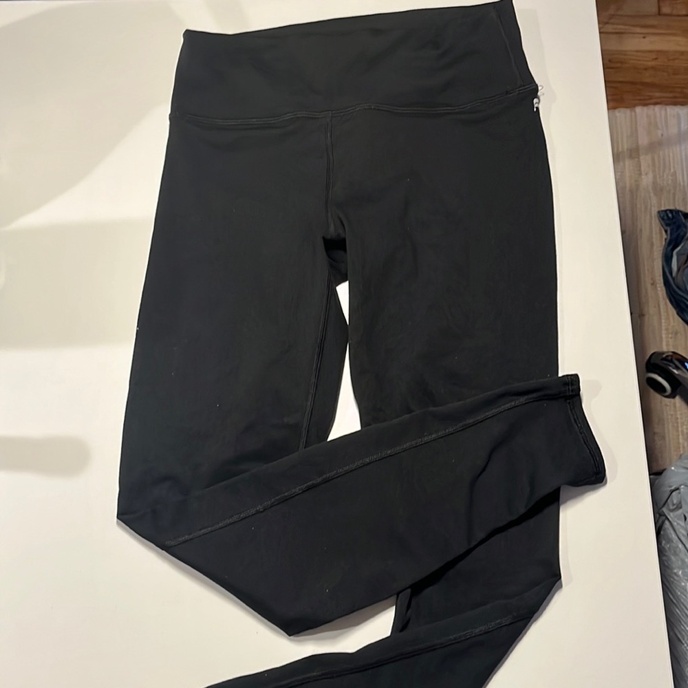Fabletics Powehold Leggings in Black. Size Medium